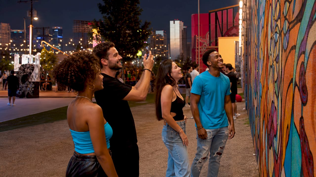 Group navigating Las Vegas Strip on foot at dusk